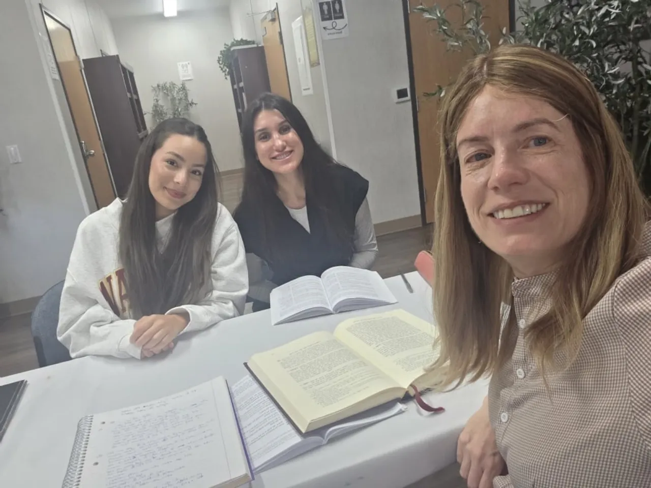 FSU students learning together with a text at the Chabad House